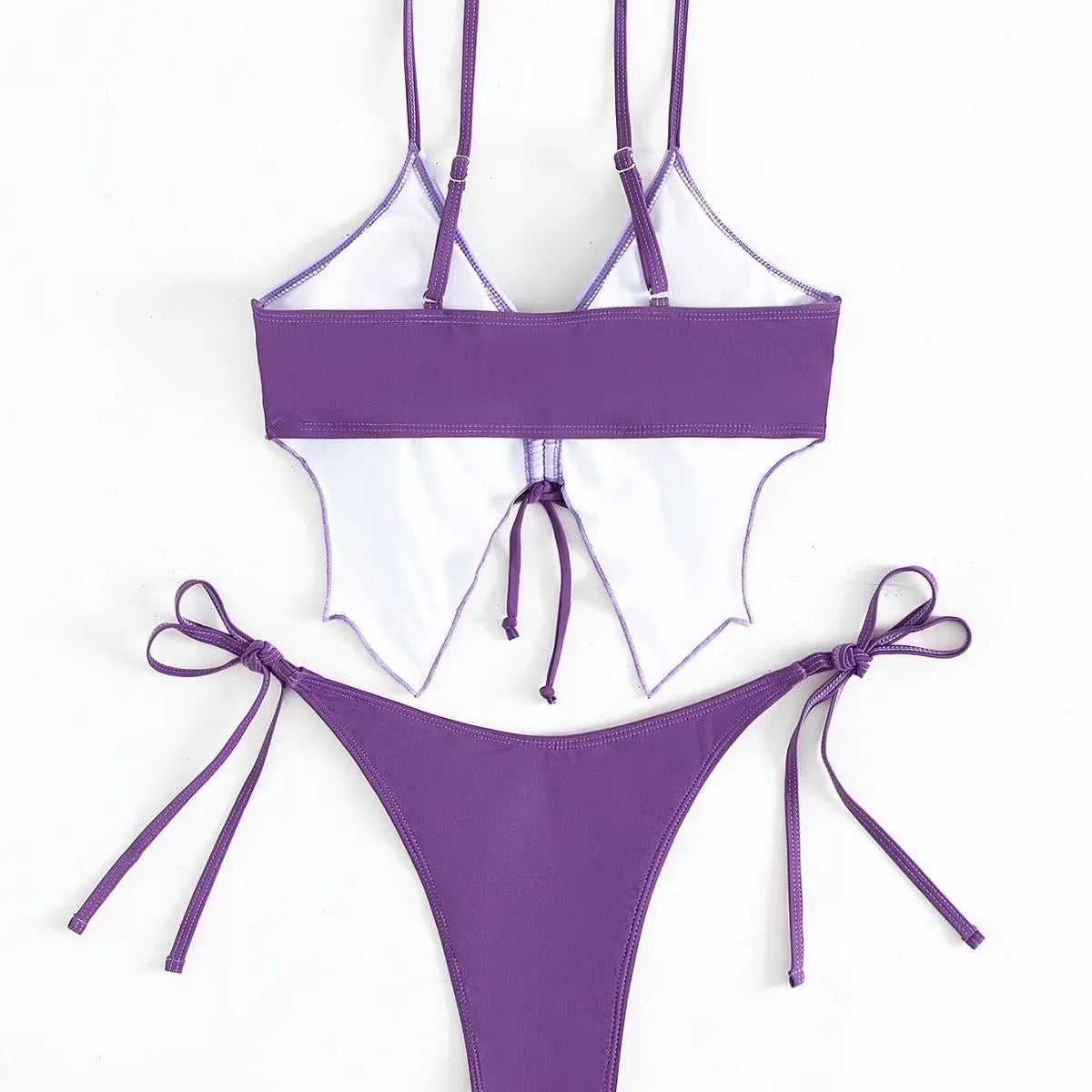 Women's sleeveless split bikini suit with bow detail in polyester fabric available in multiple colours