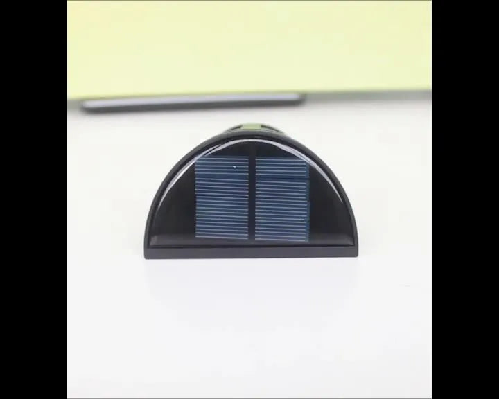Solar-powered outdoor wall lamp with LED lights and sensor control for garden and courtyard illumination