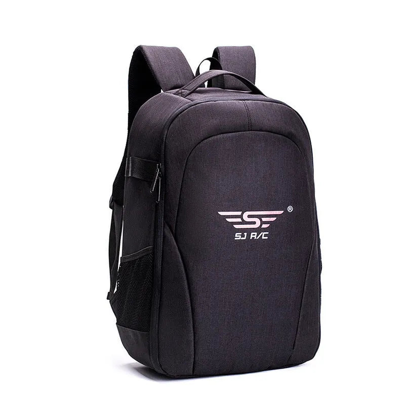 Black Oxford cloth drone backpack open to show internal camera, computer, and organiser pockets.