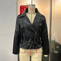 Punk style locomotive jacket with Peter Pan collar and drawstring waist in black