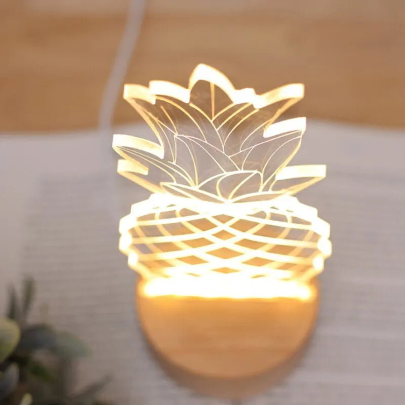 Wood and acrylic pineapple-shaped table lamp with dimmable LED light and USB power cable.