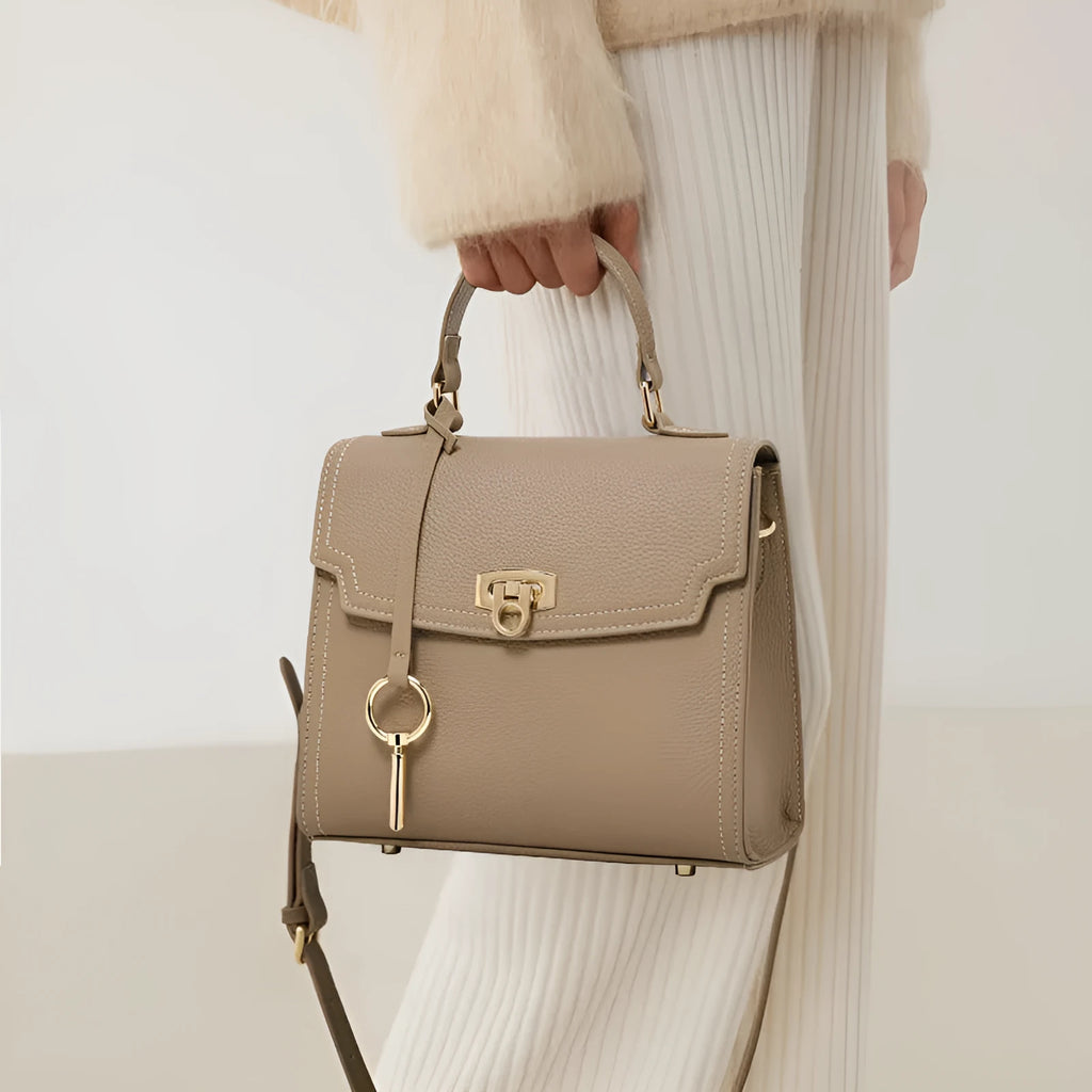 Elephant grey vintage handbag with lock closure and textured litchi pattern leather