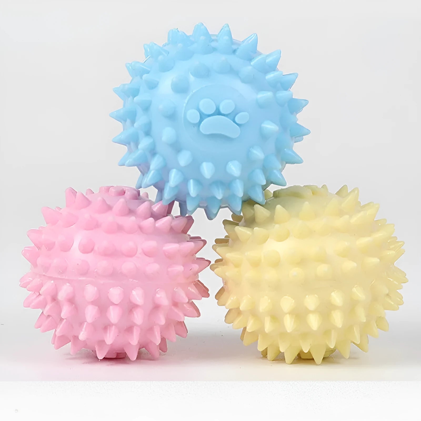 Blue TPR dog chewing toy with footprint design and soft bulging texture for tooth cleaning