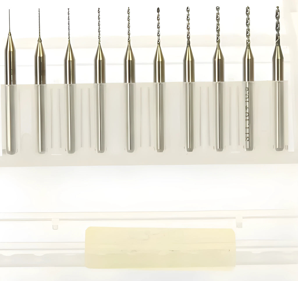 Close-up of imported tungsten carbide micro-engraving bits in various sizes from 0.10mm to 2.00mm diameter.