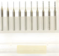 Close-up of imported tungsten carbide micro-engraving bits in various sizes from 0.10mm to 2.00mm diameter.