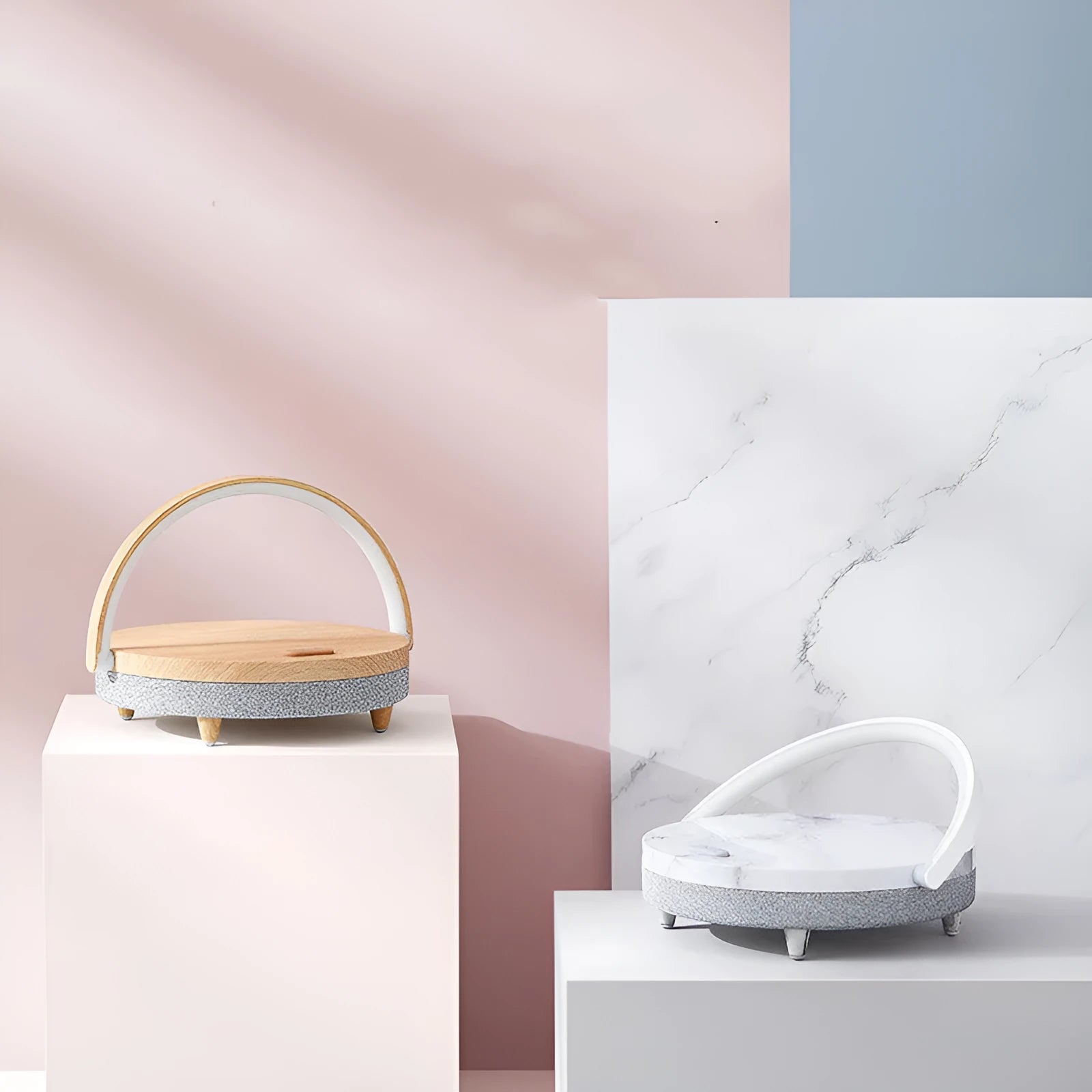 Wireless charging LED night light with Bluetooth speaker in marble finish showing phone on charging pad