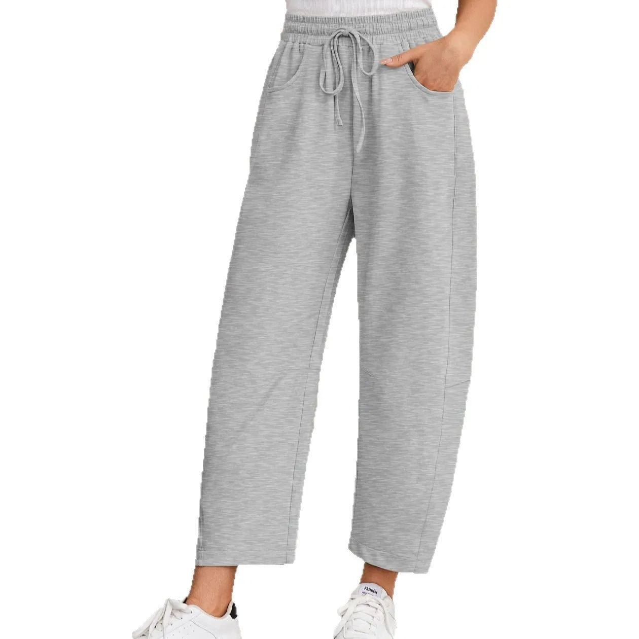 Women's loose cotton cropped sweatpants with drawstring waist in street fashion styling