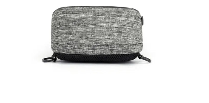 Small dark blue Oxford cloth waterproof chest bag with a zipper and adjustable strap, shown with a phone in the dedicated compartment.