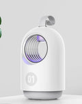 White and blue indoor mosquito killer lamp with UV light and carry handle on a table.