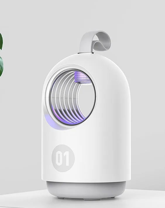 White and blue indoor mosquito killer lamp with UV light and carry handle on a table.