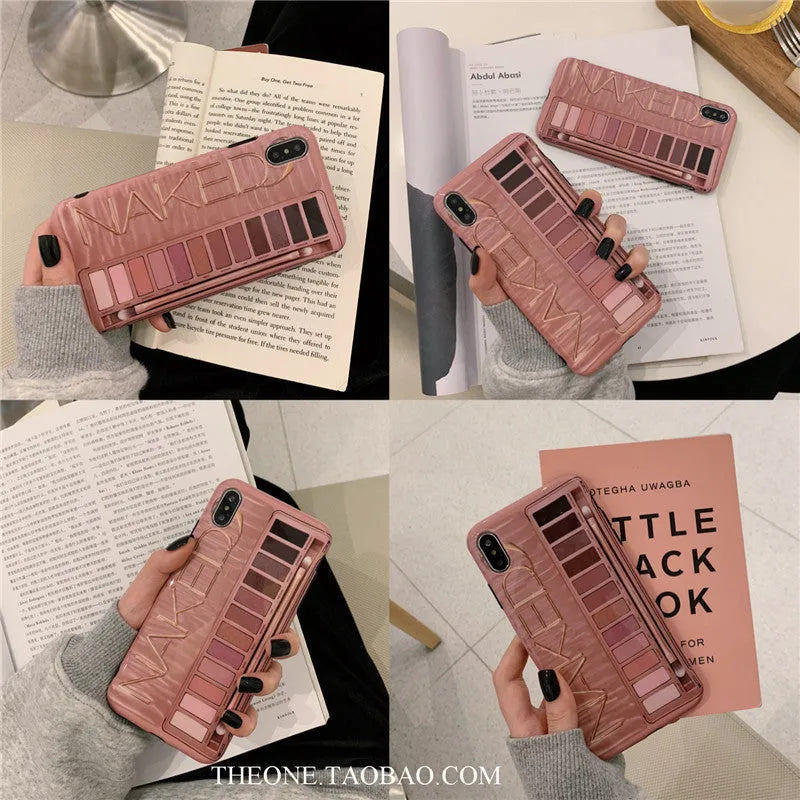 Flesh and grey silicone phone case for multiple iPhone models on a table.