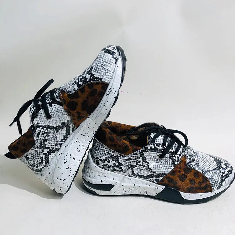 Women's wedge heel flat sneakers in breathable fabric showing round toe and slip-on design