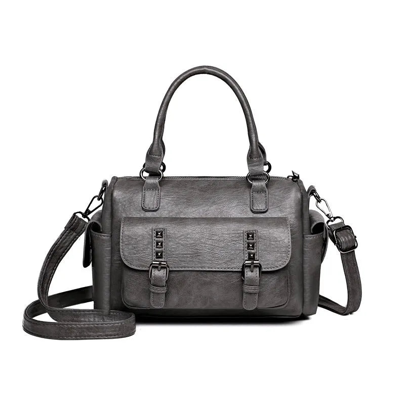Large vintage messenger bag in horizontal square shape with contrast stitching, shown in available colour options