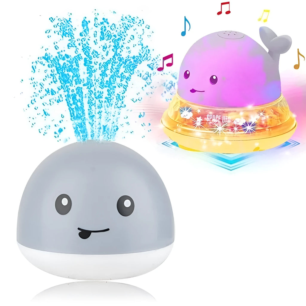 Electric whale bath toy with automatic water spray and flashing lights on a base
