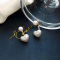 Heart-shaped alloy stud earrings for women with artificial gem inlay, Korean style.