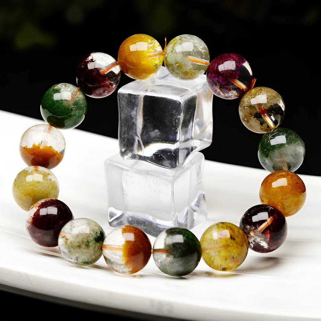 Natural crystal bracelet with colourful ghost cornucopia ethnic design featuring 10mm spherical beads