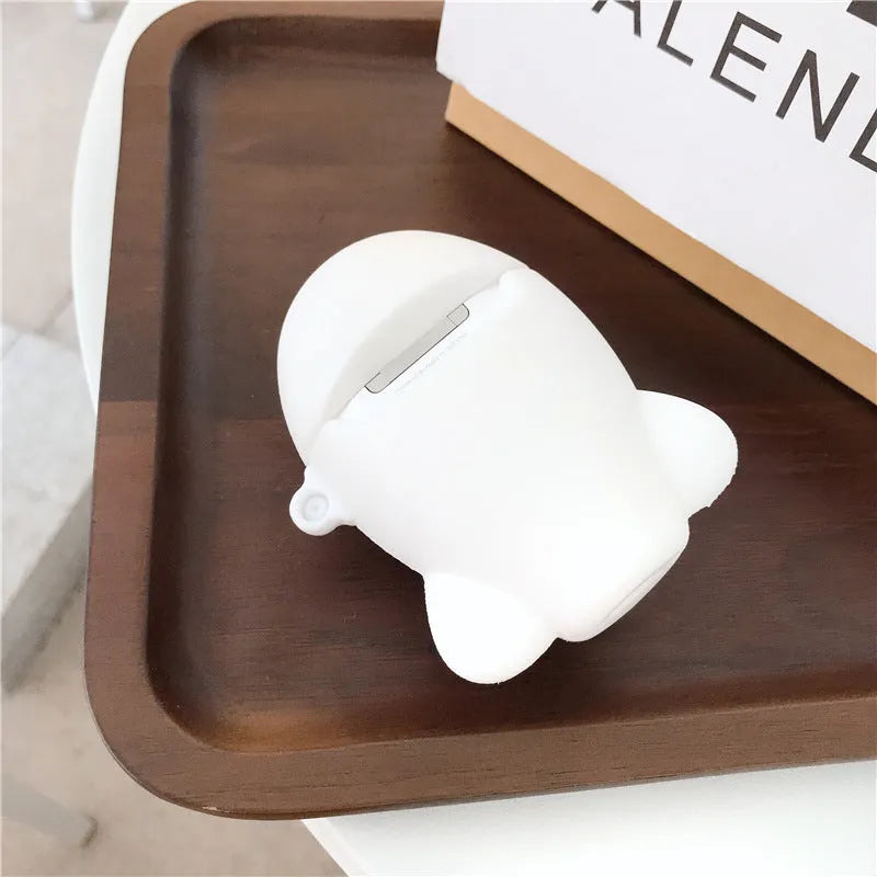 Silicone protective case for Apple AirPods with flip-top cover, cartoon aeroplane headset design, and detachable hook.
