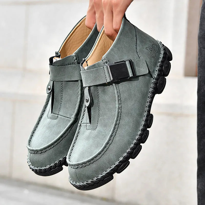 Black handmade stitch slip-on lazy shoes flat bottom low heel on wooden floor