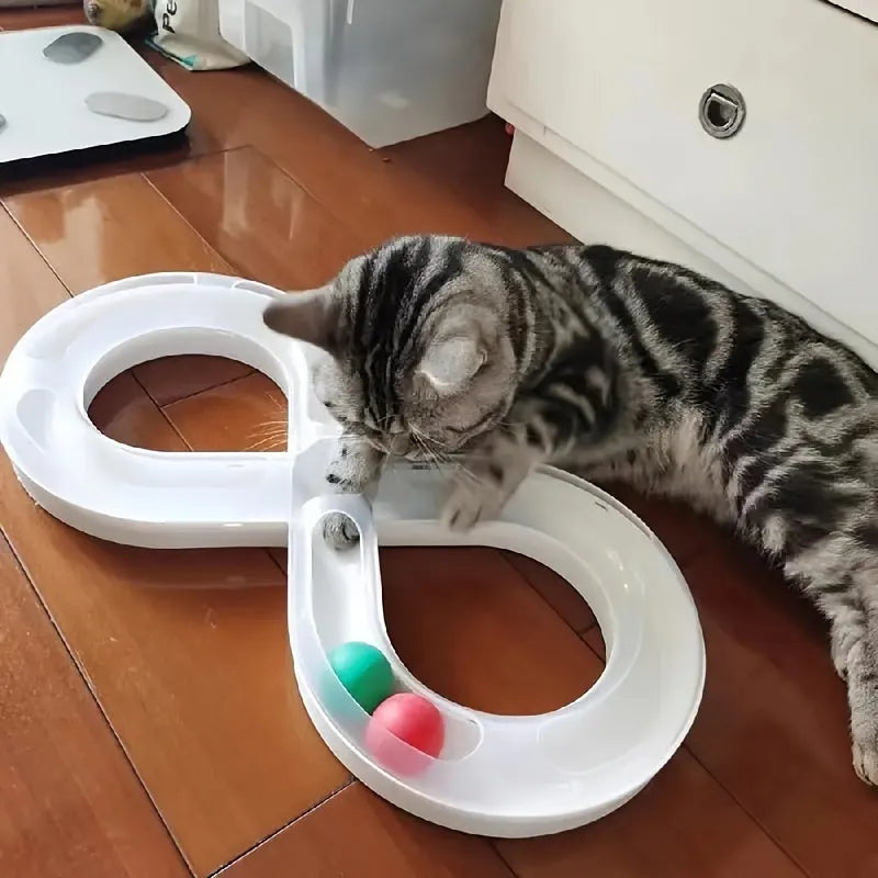 Blue and white cat turntable track ball toy with spinning mechanism for interactive play