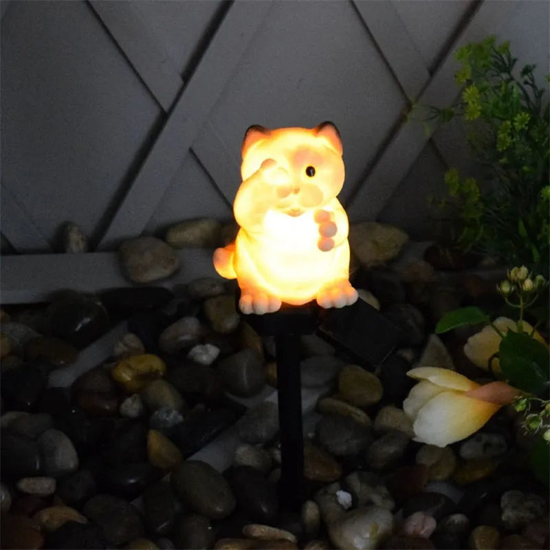 Brown solar-powered cat lawn light for garden decoration with LED illumination