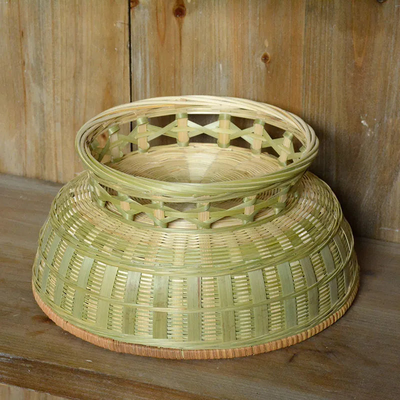 Handmade woven bamboo storage basket in one of three sizes for household organisation.