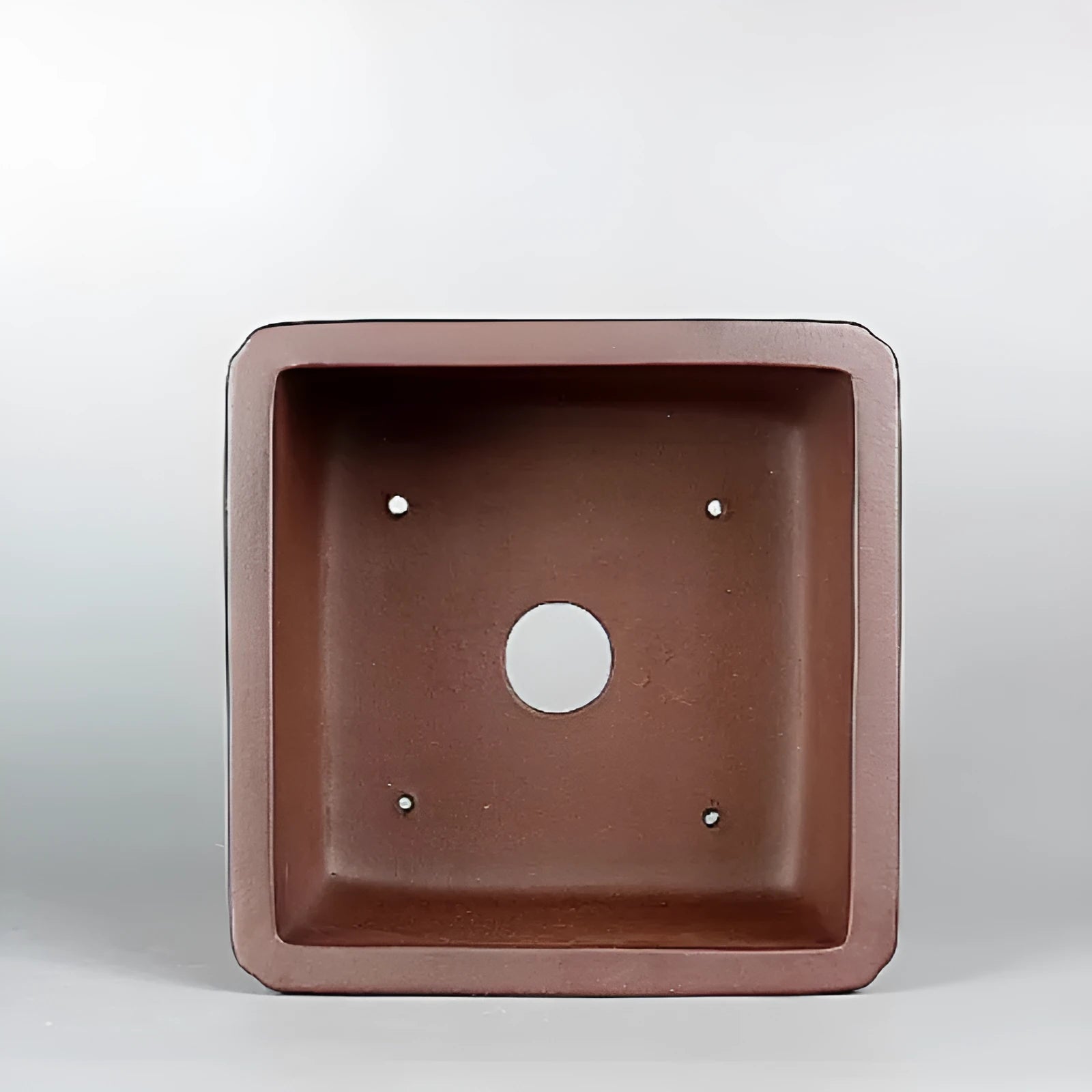 Brown antique handmade purple clay flower pot measuring 19x19x11.5 cm