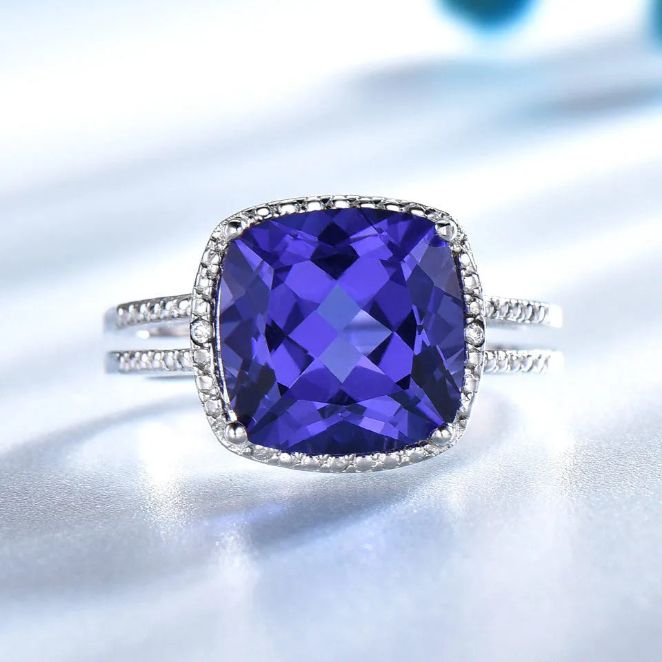 Women's 925 sterling silver ring with blue Tanzanite gemstone centrepiece