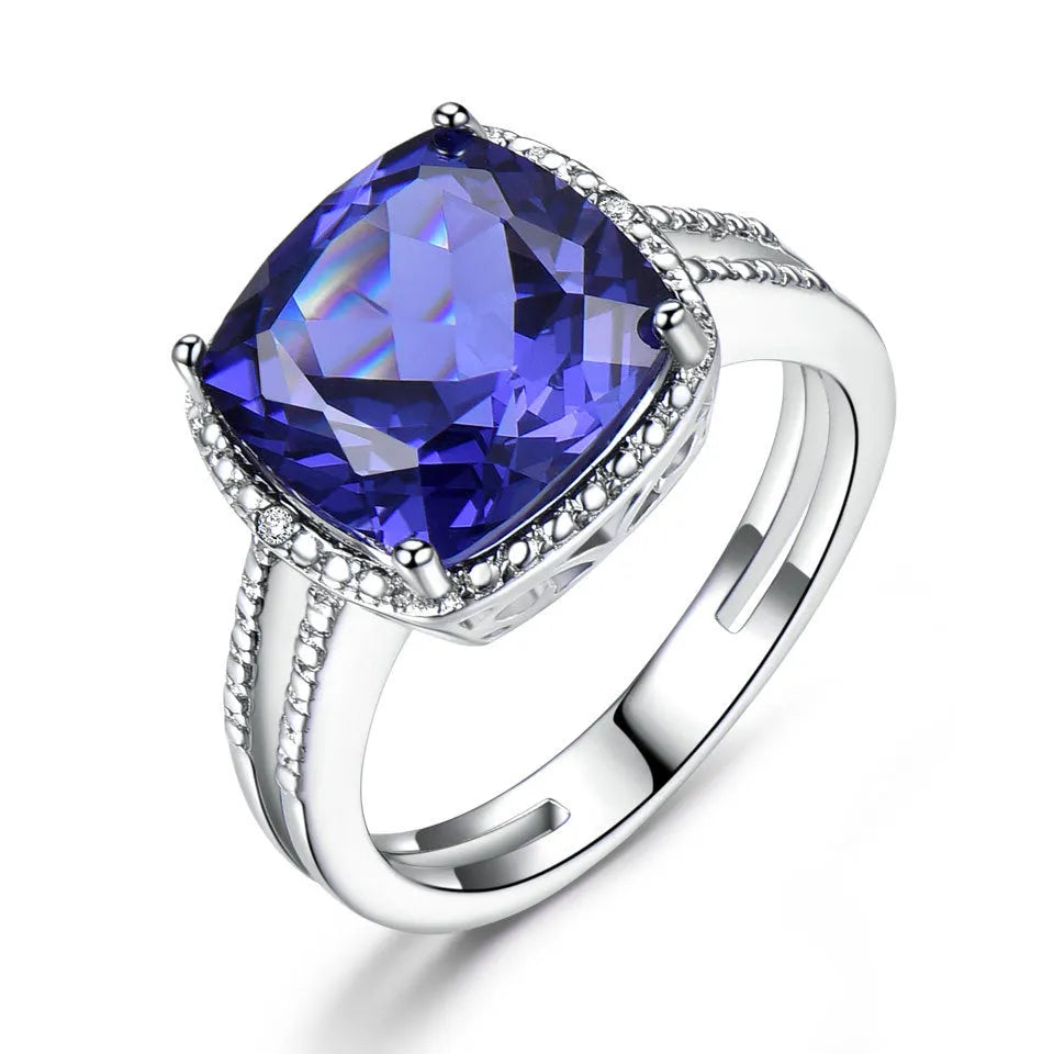 Women's 925 sterling silver ring with blue Tanzanite gemstone centrepiece