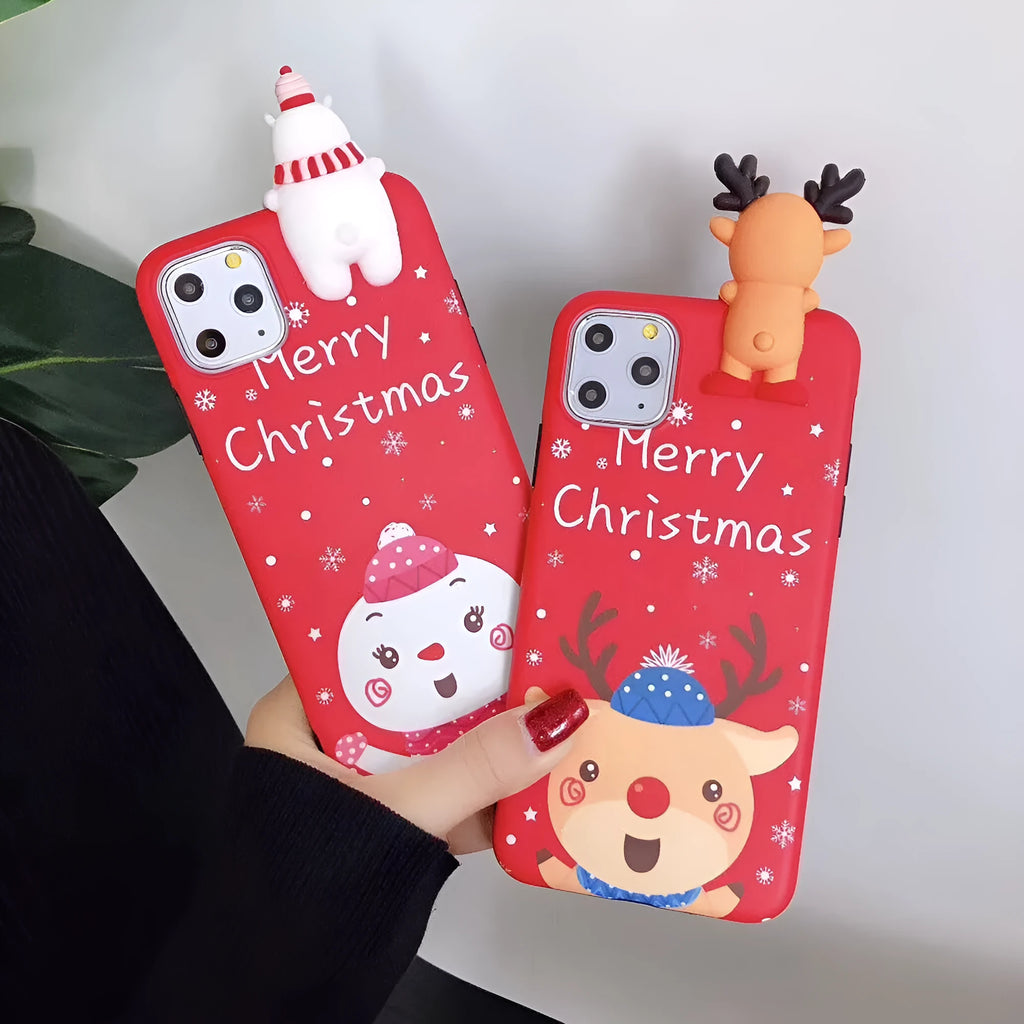 Christmas-themed silicone back cover case for iPhone on a festive background.