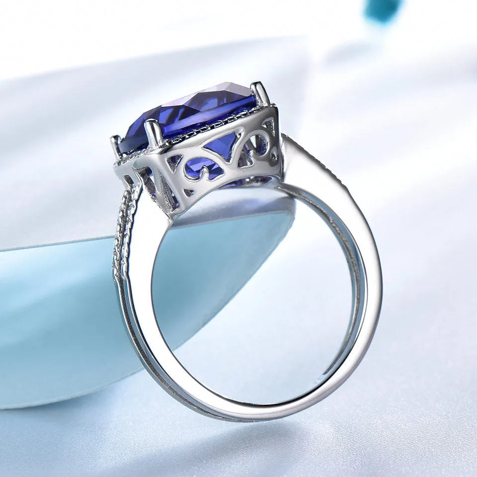 Women's 925 sterling silver ring with blue Tanzanite gemstone centrepiece