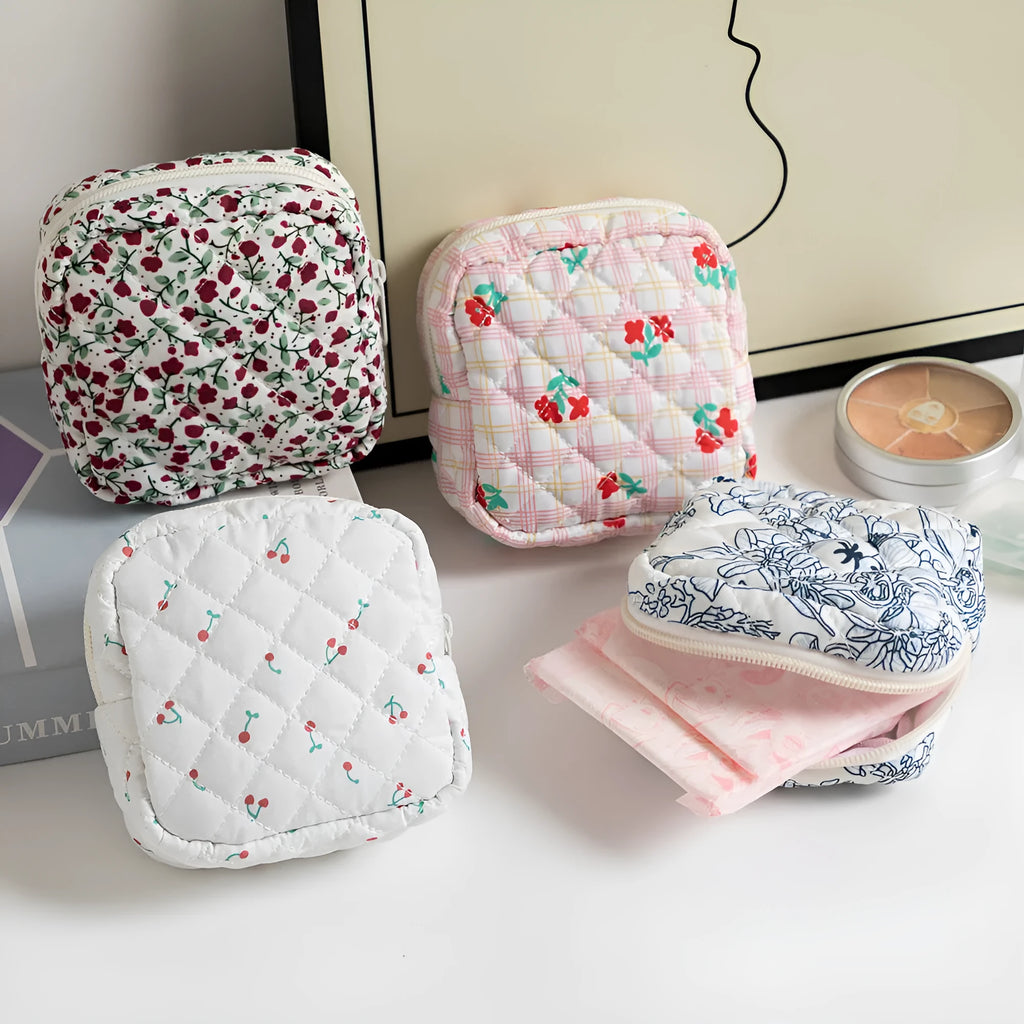 Polyester ladies key storage wallet with floral print and coin purse compartment.
