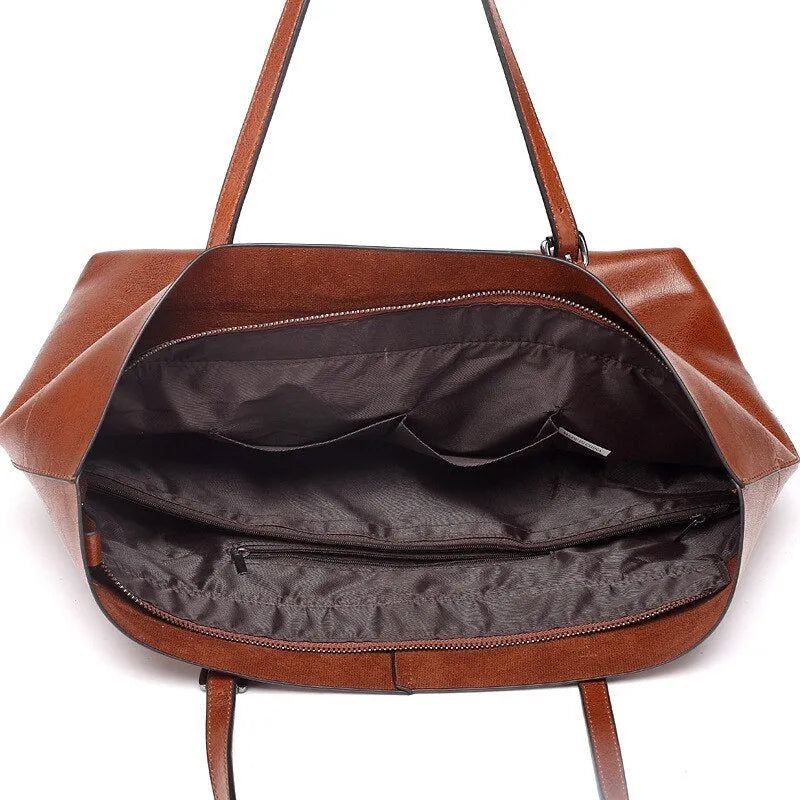 Wax cowhide leather handbag with cross-section design showing internal mobile phone pouch
