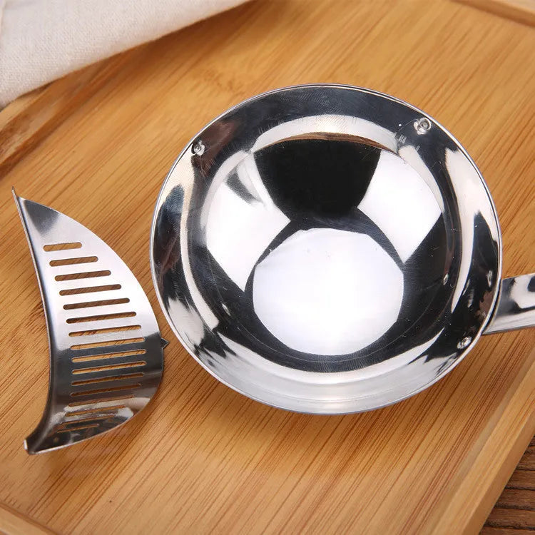 Stainless steel detachable kitchen colander spoon on a countertop