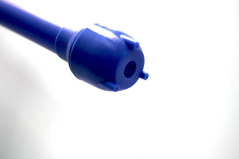 Blue and red manual hand siphon pump for transferring fuel, oil and water