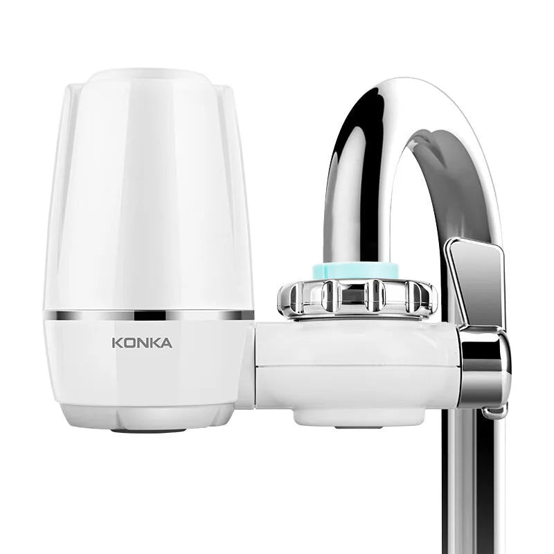 White plastic faucet water filter with ceramic cartridge and set of tap thread adapters