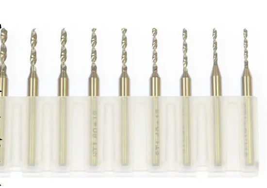 Close-up of imported tungsten carbide micro-engraving bits in various sizes from 0.10mm to 2.00mm diameter.