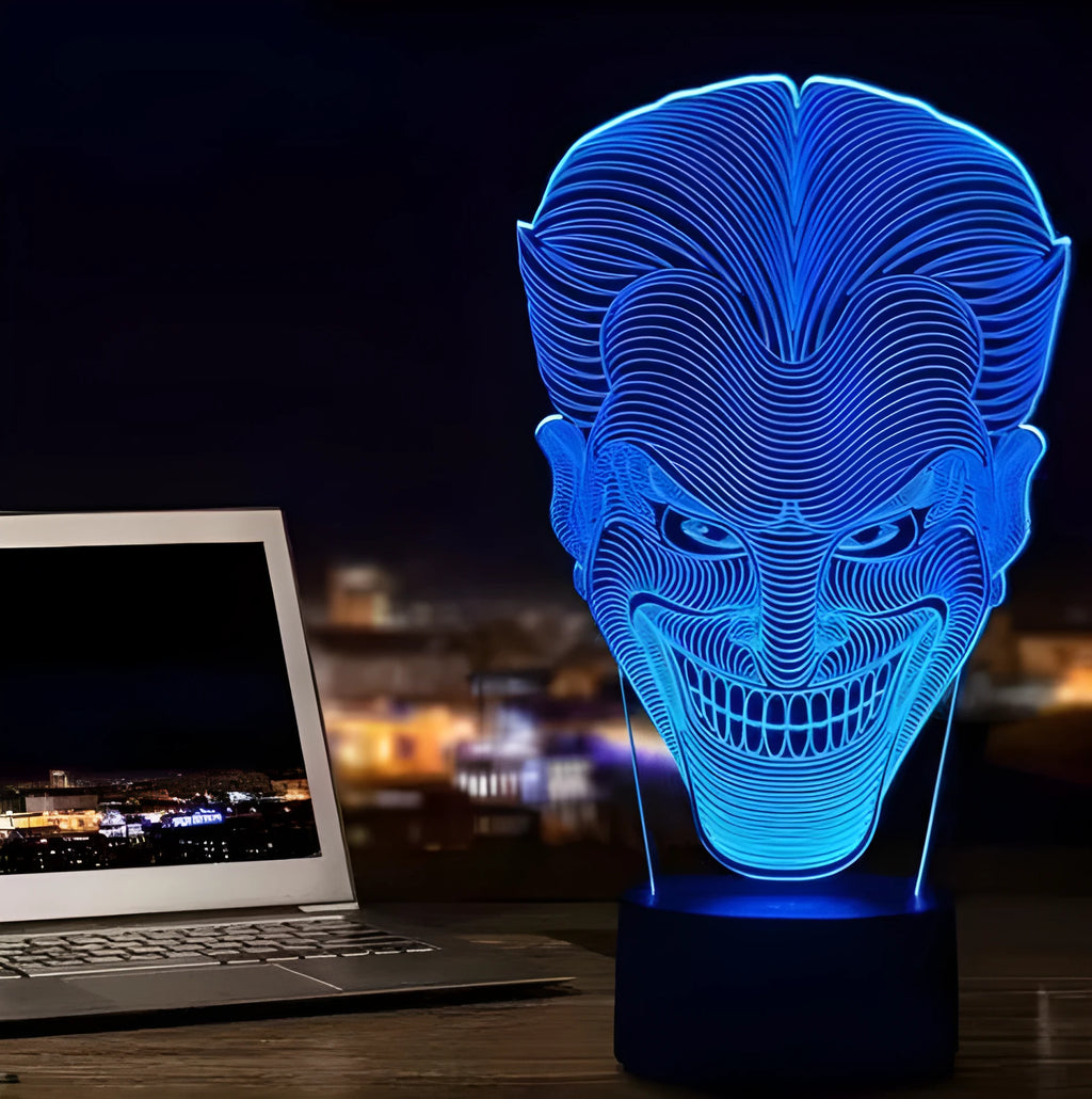 USB-powered 3D acrylic LED lamp showing multiple colour options on a desk