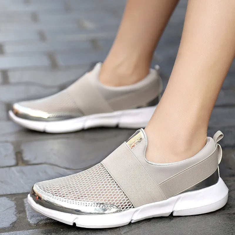 Women's blue mesh summer sneakers with low-top design on hard floor