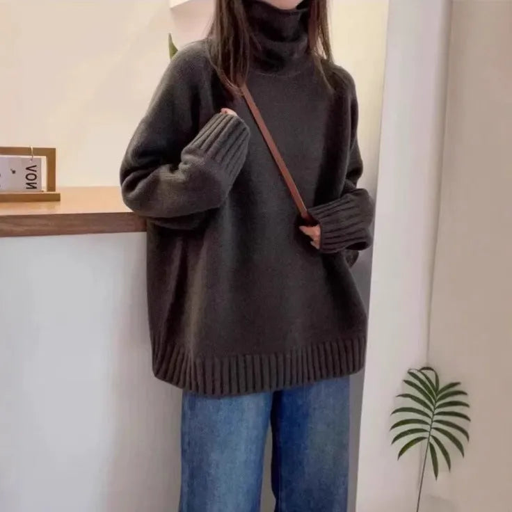Women's loose turtleneck sweater with thick curling pile collar in mesh fabric