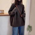 Women's loose turtleneck sweater with thick curling pile collar in mesh fabric