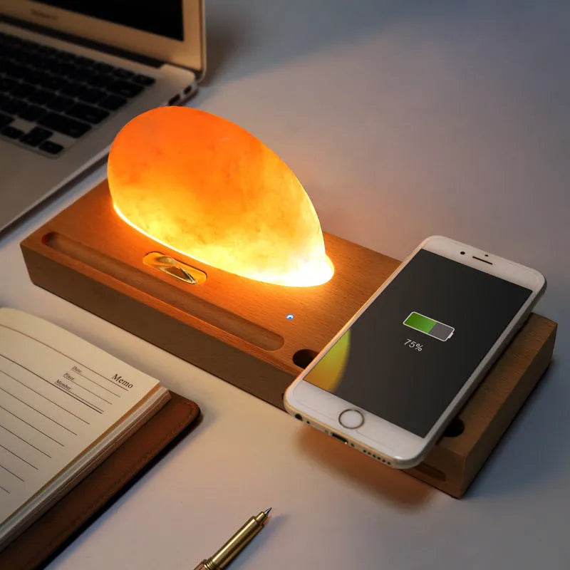 Sunrise Oriental wooden base table lamp with natural salt block shade and integrated wireless phone charging pad.