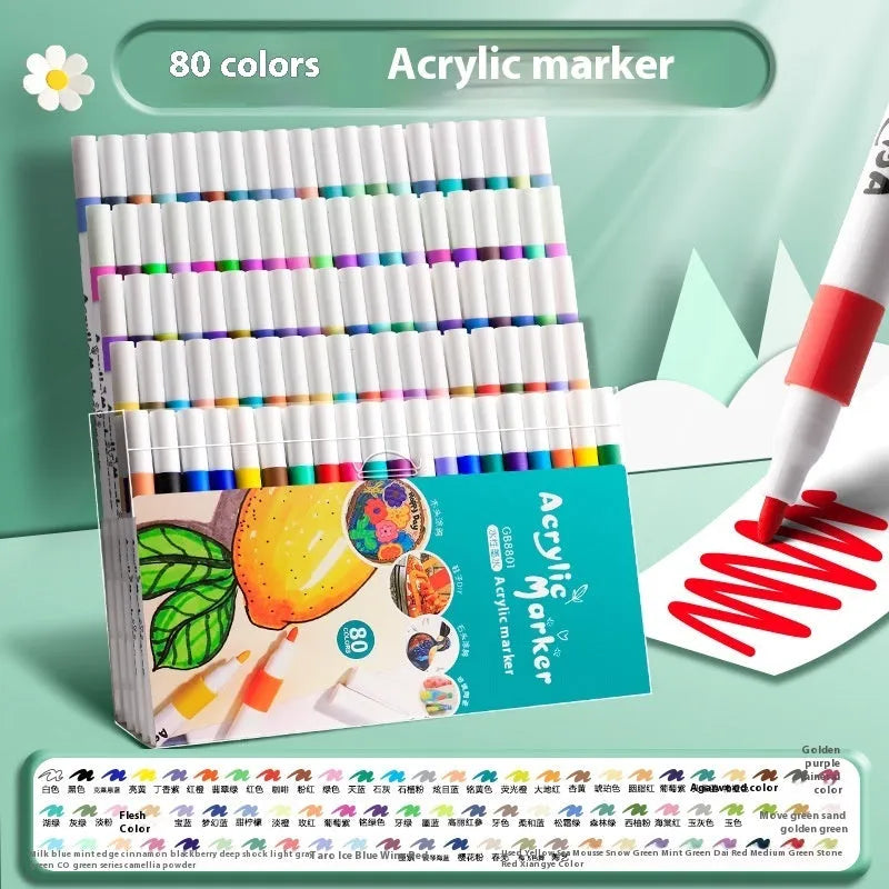 Box of acrylic marker pens for student colour painting showing multiple colour options