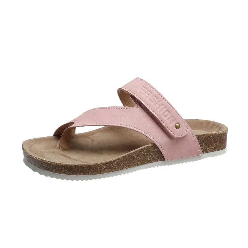 Women's blue flip-flops with a thick foam sole and a flat toe ring design on a solid colour artificial PU upper.