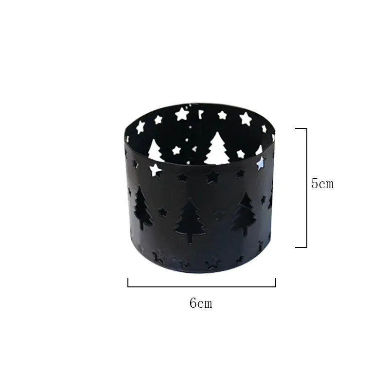 Black iron Christmas deer candlestick holder with elk bracket and festive motifs.