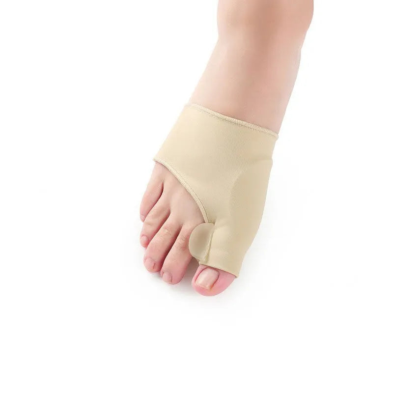 Corrective bunion relief sock with silicone gel pad and toe spacer on a foot, showing stretch fabric.