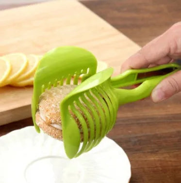 Fruit and veggie cutting holder plastic slicer for tomatoes with cut-through gap design