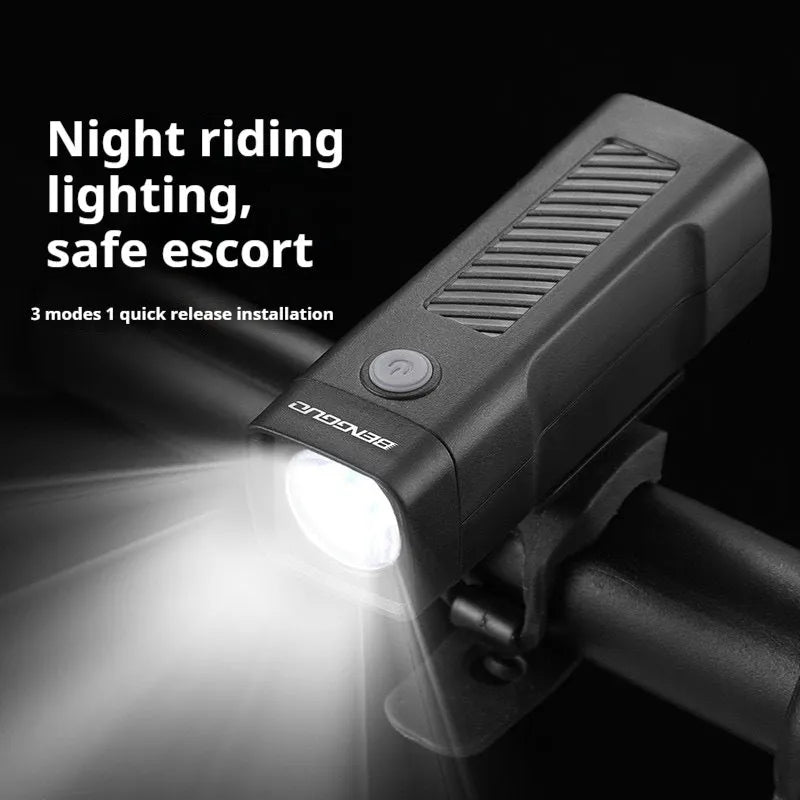 USB rechargeable bicycle headlight mounted on bike handlebars with 100 lumens brightness for night riding