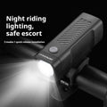 USB rechargeable bicycle headlight mounted on bike handlebars with 100 lumens brightness for night riding