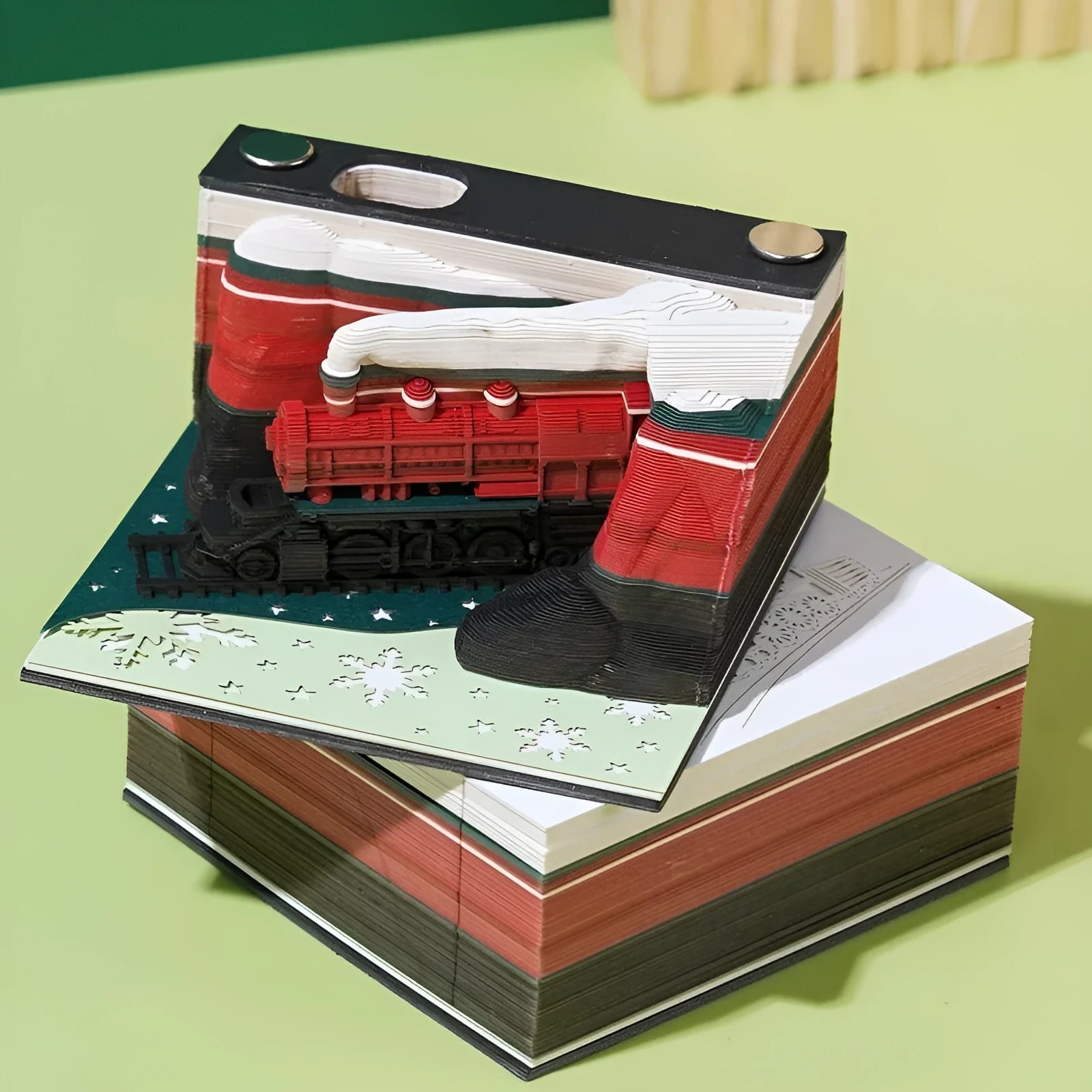 3D Sticky Notes pad with a carved paper Christmas Train design on the cover.