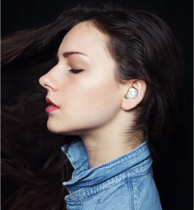M18 true wireless Bluetooth earbuds in black and white with compact rectangular charging case
